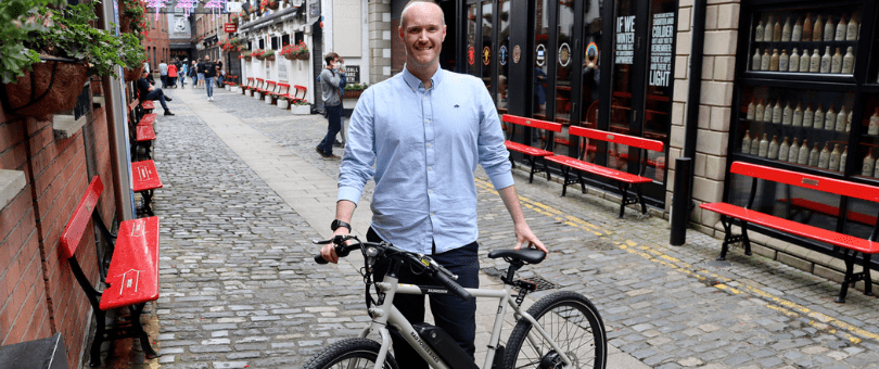 Signifyd's Steve McComb with the Rad Power Bike he won as part of a company Earth Day initiative