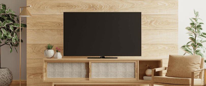 A large TV on a stand in a contemporary living room